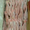 Premium frozen JTB fish with characteristic pink-silver scales and yellow stripes, flash-frozen for high-quality frozen seafood retail.