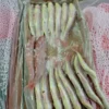 Premium frozen JTB fish with characteristic pink-silver scales and yellow stripes, flash-frozen for high-quality frozen seafood retail.