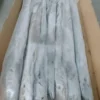 Premium ribbon fish with a distinct silver sheen layered in a bulk shipping box for the frozen seafood market.