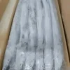 Premium ribbon fish with a distinct silver sheen layered in a bulk shipping box for the frozen seafood market.