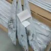Premium ribbon fish with a distinct silver sheen layered in a bulk shipping box for the frozen seafood market.