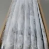 Premium ribbon fish with a distinct silver sheen layered in a bulk shipping box for the frozen seafood market.